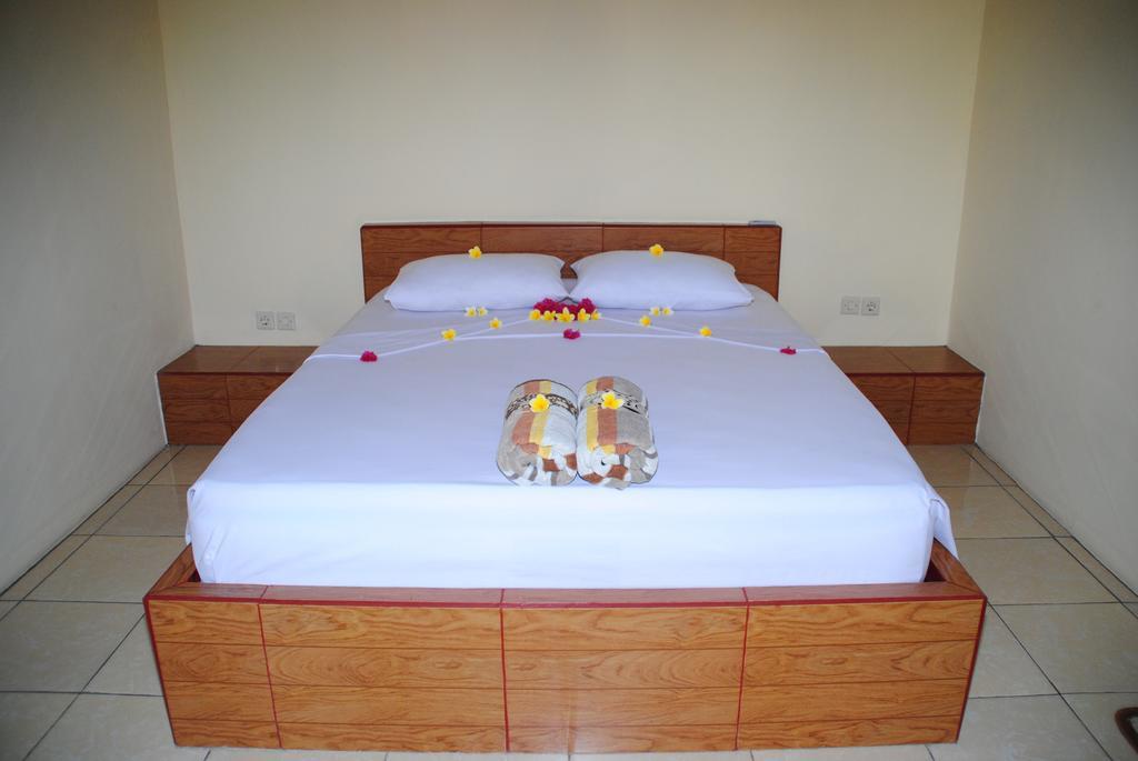Kubu Sari Guest House Pemuteran Quarto foto