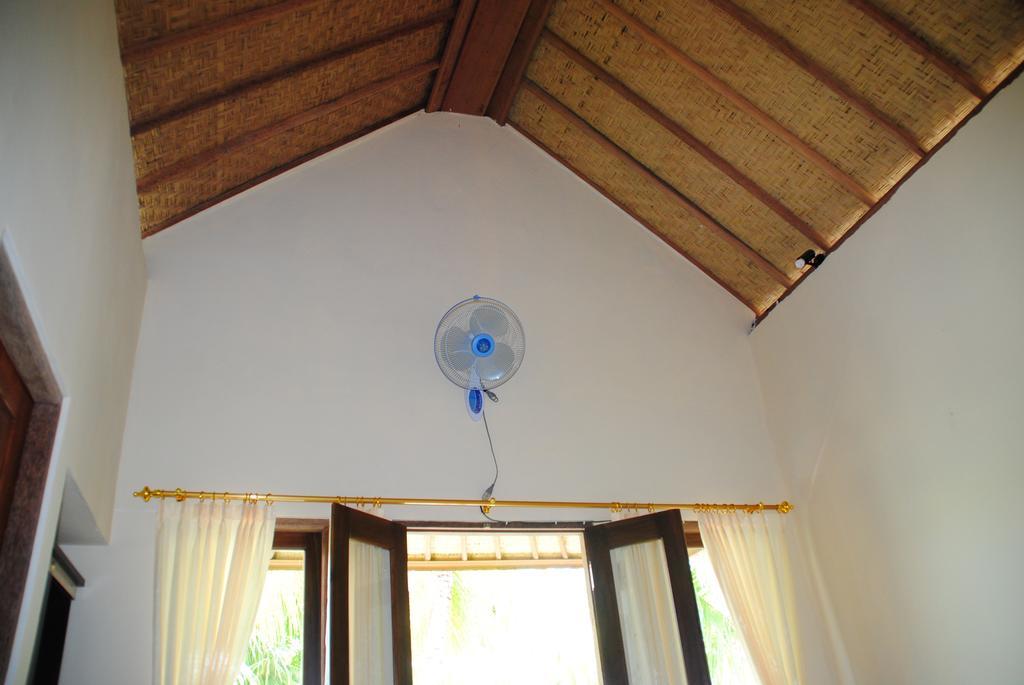 Kubu Sari Guest House Pemuteran Quarto foto